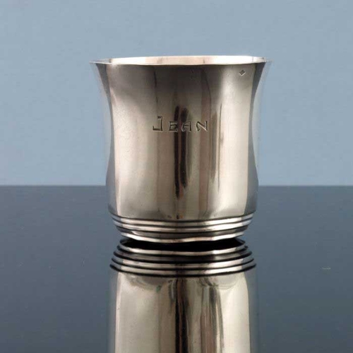 259 - Jean Emile Puiforcat, a French silver beaker, Paris circa 1930, flared form with concentric stepped ... 