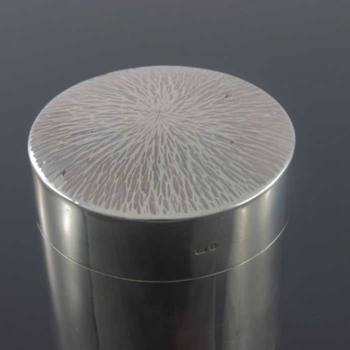 266 - A Modernist silver tea caddy, Neil Lovesey, London 1972, cylindrical form with textured bark effect ... 