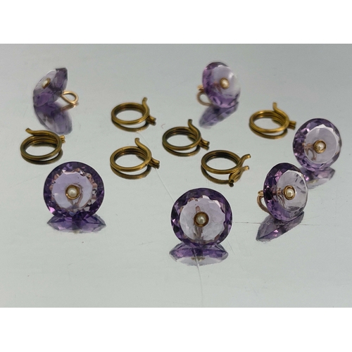 297 - A set of six amethyst, gold and split pearl buttons, each concave facet cut button with central pear... 