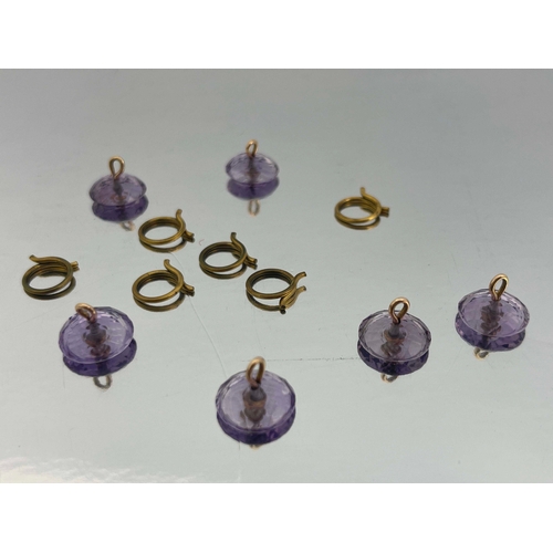 297 - A set of six amethyst, gold and split pearl buttons, each concave facet cut button with central pear... 