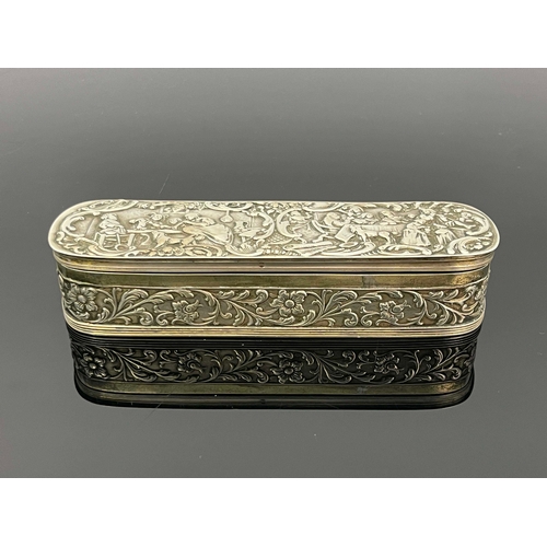 18 - A Dutch silver tobacco box, 1910, oblong rounded form, the lid embossed with tavern scenes within C ... 