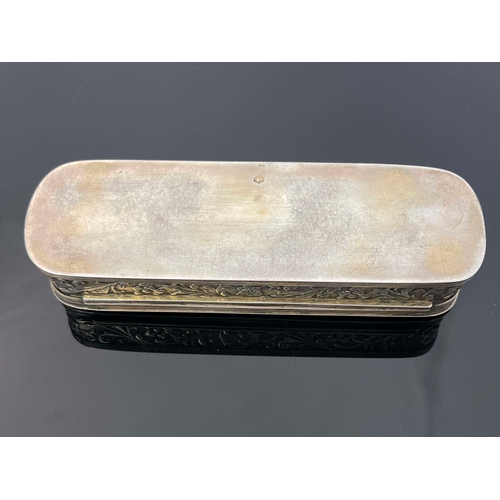 18 - A Dutch silver tobacco box, 1910, oblong rounded form, the lid embossed with tavern scenes within C ... 