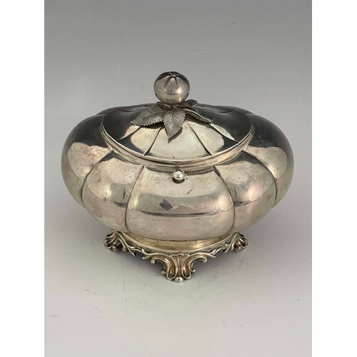 20 - A Dutch silver tea caddy,  Pieter Pieters, Amsterdam circa 1860, lobed ovoid form on cast foliate br... 