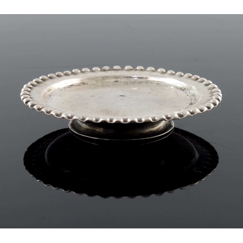 22 - An 18th century miniature Dutch tazza, Amsterdam circa 1730, circular form with embossed beaded bord... 