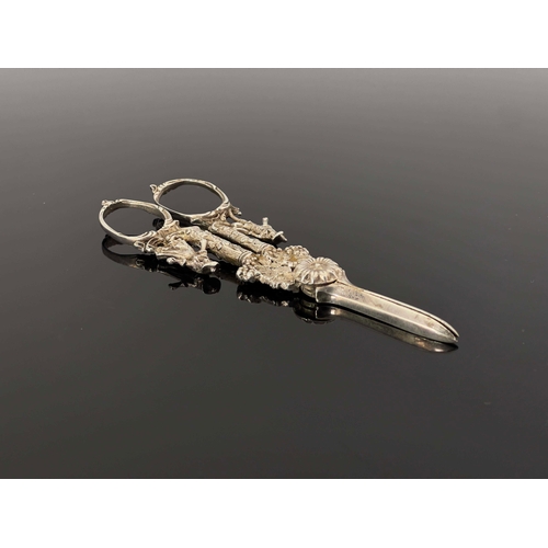 23 - A pair of cast white metal grape scissors, probably Dutch, circa 1890, in the Rococo style, modelled... 