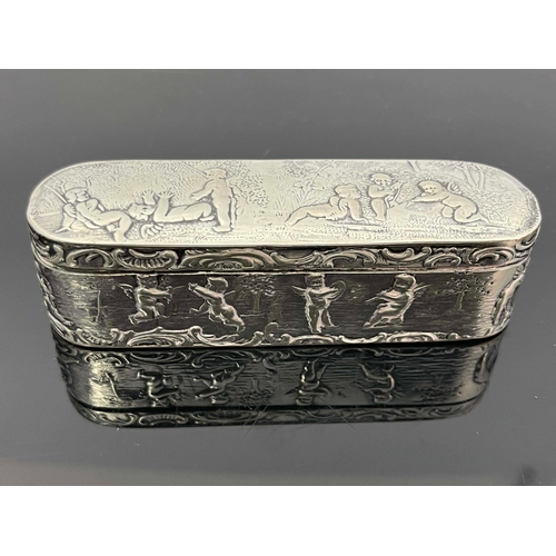 24 - A Dutch silver snuff box, rounded oblong form, the hinged lid and base embossed with putti within C ... 