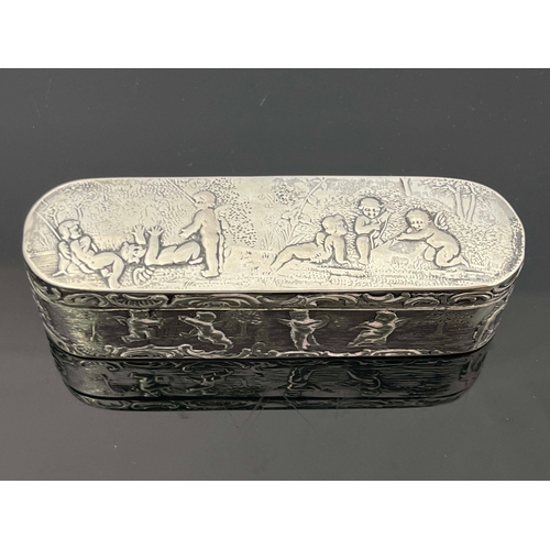 24 - A Dutch silver snuff box, rounded oblong form, the hinged lid and base embossed with putti within C ... 