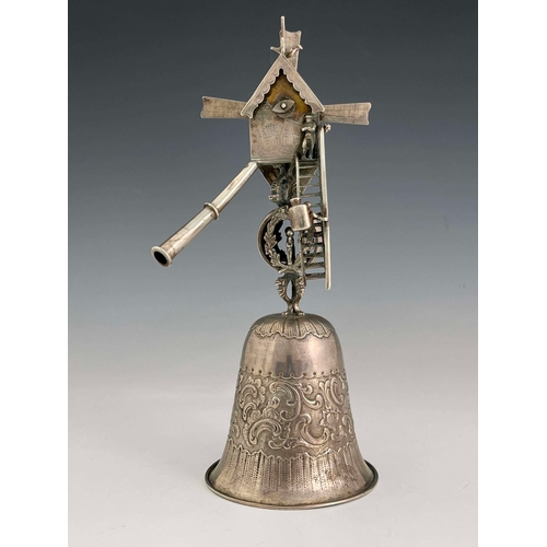 26 - A Dutch silver Windmill cup/wager cup, 1898, bell shaped repousse cup, with open-worked stem and pit... 