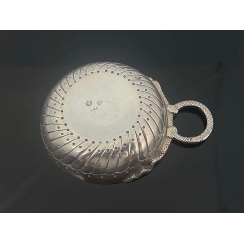 28 - A Late 18th century French silver wine taster, shallow dished circular form with embossed gadrooned ... 