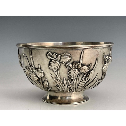 3 - A Chinese silver bowl, circular footed form, with applied moulded iris leaves and flowers, on flared... 