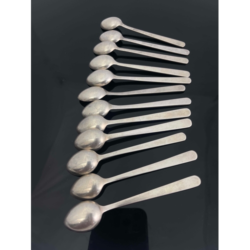 32 - A set of 12 niello white metal spoons, unmarked, Egyptian scenes niello to handle, 11cm length, 4.69... 