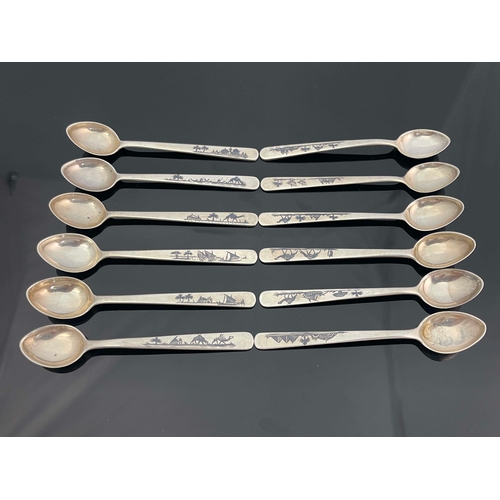 32 - A set of 12 niello white metal spoons, unmarked, Egyptian scenes niello to handle, 11cm length, 4.69... 