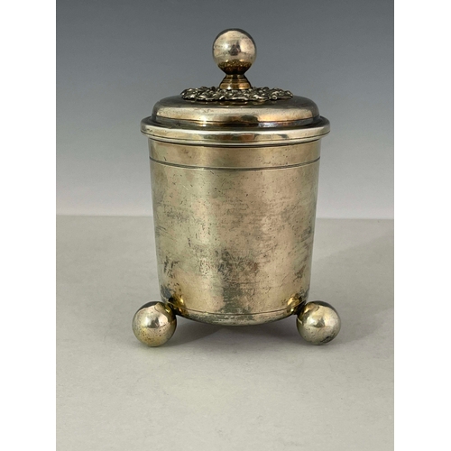 34 - A German silver gilt cup and cover, Augsburg circa 1680, beaker form, on three ball feet with ball k... 