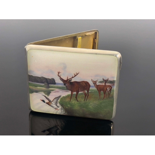 40 - A German silver and enamelled cigarette case, Louis Kuppenheim, Profzheim circa 1920, cushioned rect... 