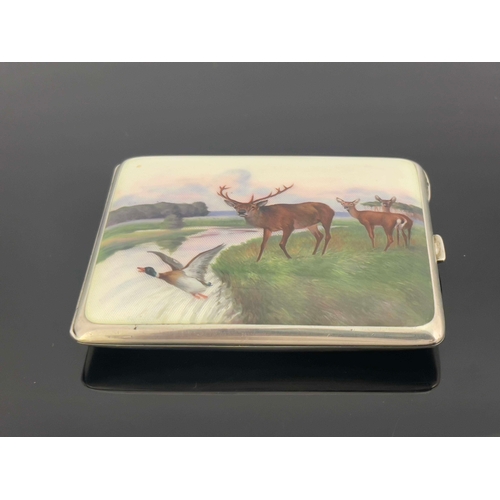 40 - A German silver and enamelled cigarette case, Louis Kuppenheim, Profzheim circa 1920, cushioned rect... 