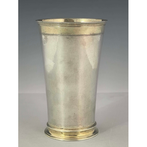 43 - An early 18th century German silver and parcel gilt beaker, WS, Augsburg 1737-39, trumpet form, gilt... 