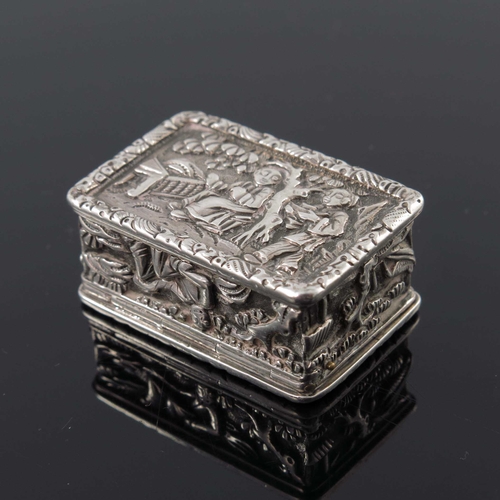 5 - A Chinese export silver vinaigrette, circa 1900, relief moulded and cast with a populated garden sce... 