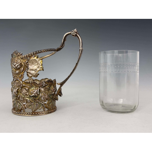 64 - An Elizabeth II silver embossed tea glass holder, Ari D Norman, London 1991, embossed decoration wit... 