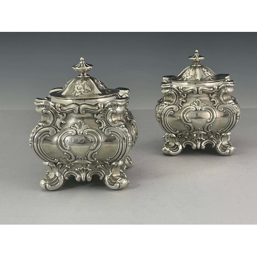 67 - A pair of Victorian silver tea caddies, Hawkesworth, Eyre & Co, Sheffield 1846, cubed form with roco... 