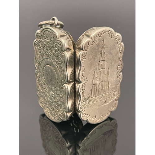 74 - A Victorian silver vinaigrette, James Fenton, Birmingham 1864, engraved with the Scott Monument Edin... 