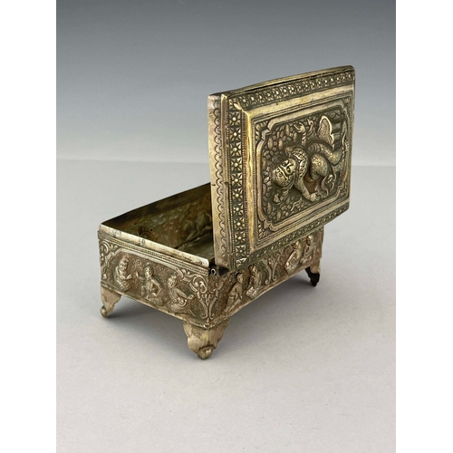 9 - An Indian white metal casket, late 19th century, repousse decorated and embossed with Oriental figur... 