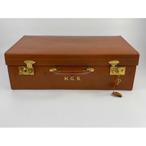 94 - A George VI Mappin & Webb dressing case, monogrammed canvas foul weather cover, tan leather case wit... 