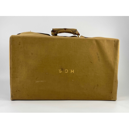 94 - A George VI Mappin & Webb dressing case, monogrammed canvas foul weather cover, tan leather case wit... 