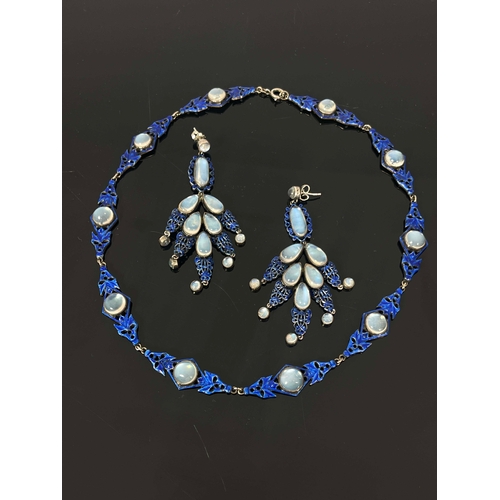 303 - Sibyl Dunlop, an Arts and Crafts silver, enamelled and moonstone necklace and earring set, the retic... 