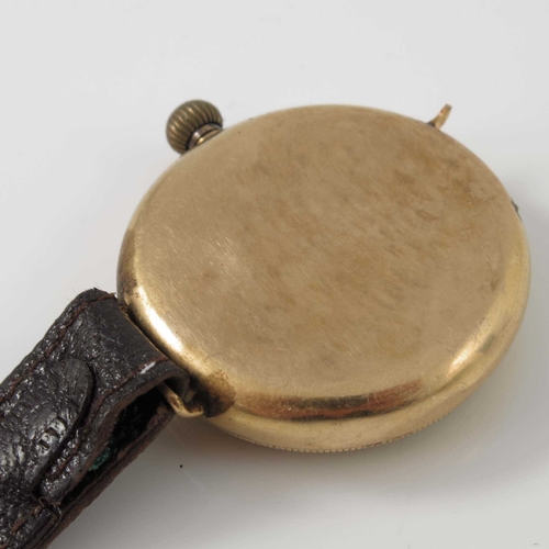 316 - An 18 carat gold wristwatch, circa 1920, 17 jewel manual wind movement, on leather strap