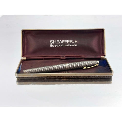 323 - Sheaffer, a silver Imperial Sovereign fountain pen, circa 1990, diamond pattern, sterling silver, wi... 