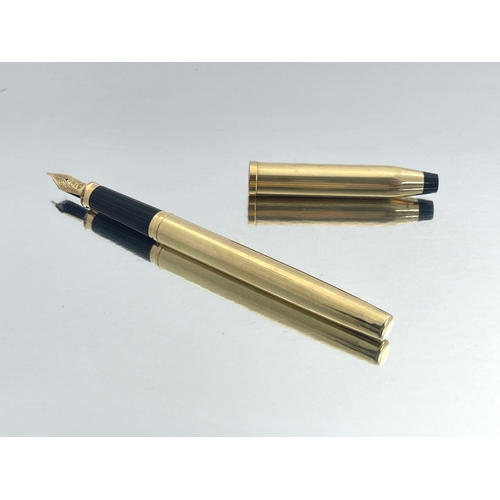 324 - Cross, a 10 carat rolled gold Century II fountain pen, circa 1990s, pinstripe design, 18 carat gold ... 