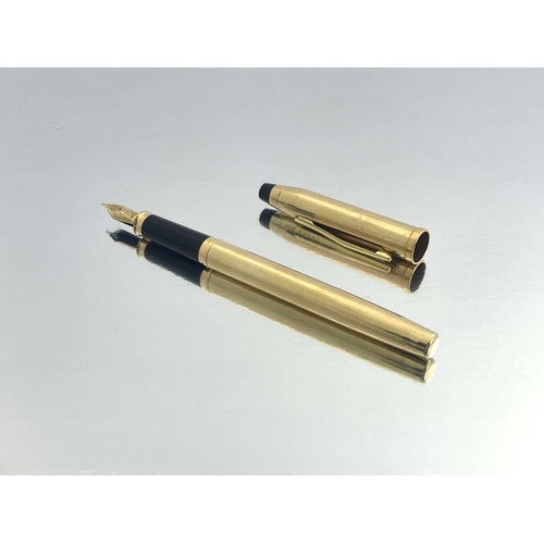 324 - Cross, a 10 carat rolled gold Century II fountain pen, circa 1990s, pinstripe design, 18 carat gold ... 