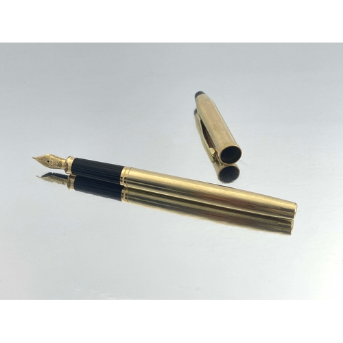 324 - Cross, a 10 carat rolled gold Century II fountain pen, circa 1990s, pinstripe design, 18 carat gold ... 