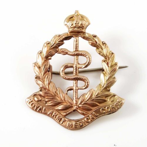 348 - A 9ct gold Royal Army Medical Corps brooch, 2.8cm wide, 2g