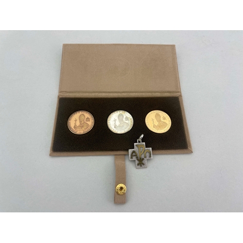 355 - Vatican City, Millennium 2000 18ct gold, silver and bronze 3-coin set of Pope John Paul II, in the s... 