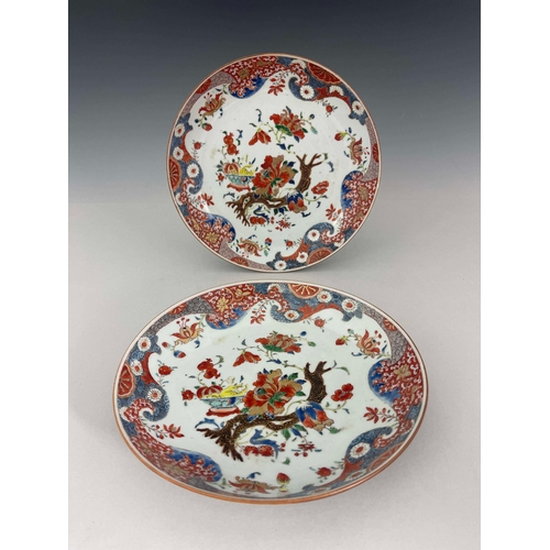 361 - A pair of Imari dishes, circular form, enamelled with peony branches and bowls of pomegranates and f... 