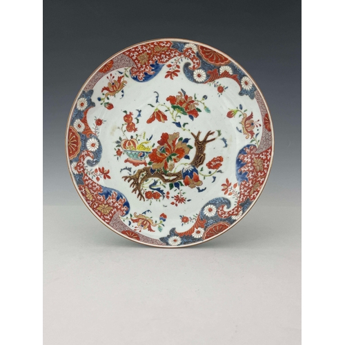 361 - A pair of Imari dishes, circular form, enamelled with peony branches and bowls of pomegranates and f... 