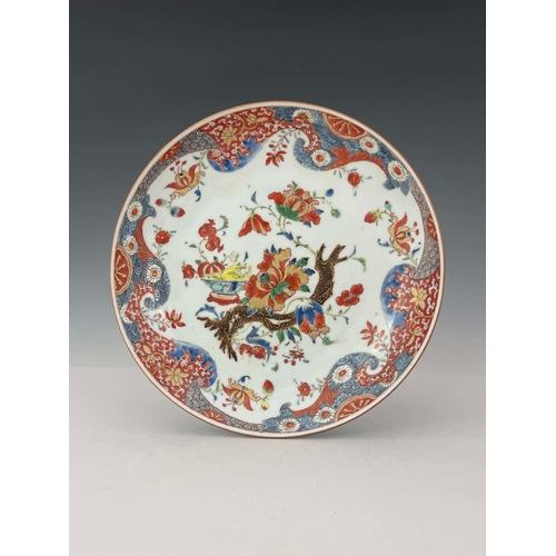 361 - A pair of Imari dishes, circular form, enamelled with peony branches and bowls of pomegranates and f... 