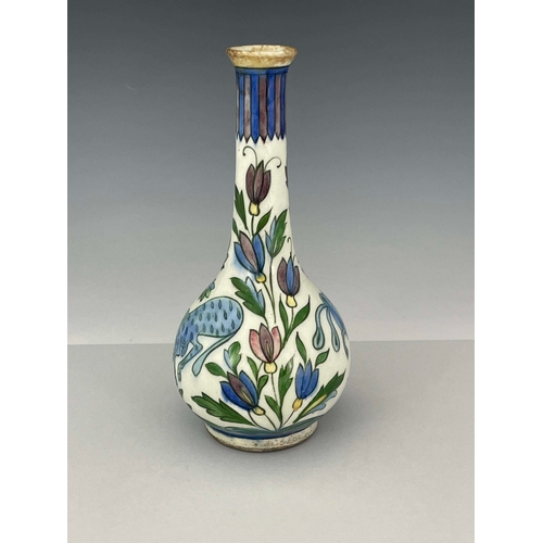 368 - A Persian bottle vase, 19th Century, extended neck, bulbous body, painted with wild animals amongst ... 