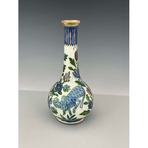 368 - A Persian bottle vase, 19th Century, extended neck, bulbous body, painted with wild animals amongst ... 