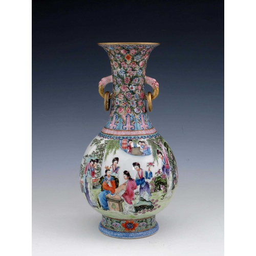 377 - A Chinese Republican famille rose vase, twin handled baluster form, painted in the round with a terr... 