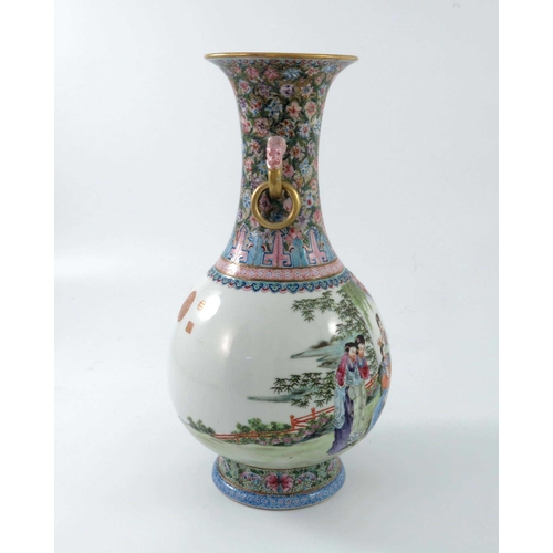 377 - A Chinese Republican famille rose vase, twin handled baluster form, painted in the round with a terr... 