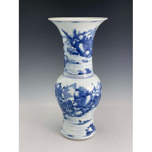 379 - A Chinese blue and white yen yen vase, 18th Century, flared rim, painted with a continuous mountaino... 