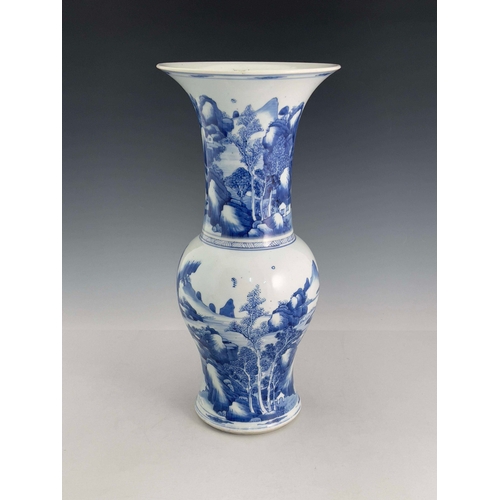 379 - A Chinese blue and white yen yen vase, 18th Century, flared rim, painted with a continuous mountaino... 