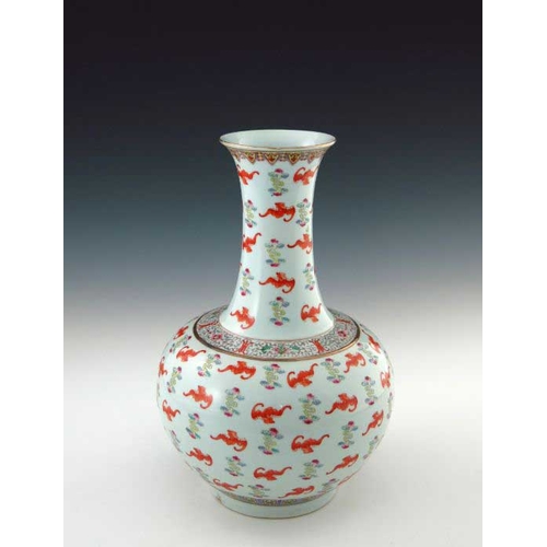 388 - A 20th Century Chinese baluster vase, extended neck, ovoid body, the whole decorated with iron red b... 