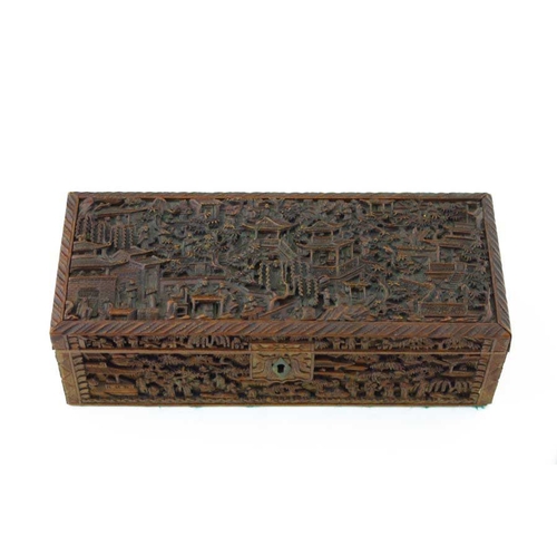 403 - A late 19th Century Canton treen table casket, carved throughout in high relief with figures and pag... 