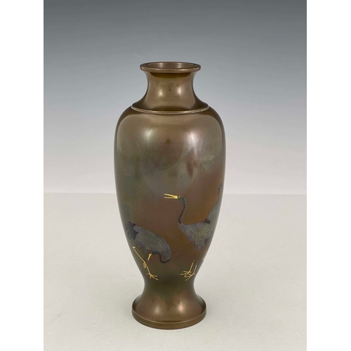 419 - A Japanese inlaid bi-metal bronze vase, Meiji period, 1868-1912. of slender baluster form with a tri... 