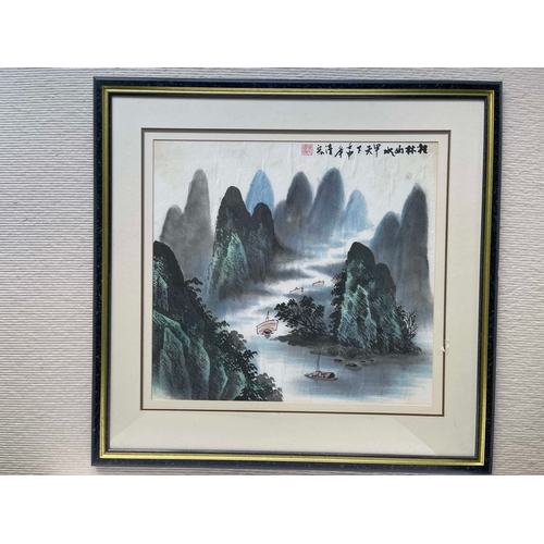 422 - Chinese School, 20th Century, a mountainous river landscape with sailing boats, titled and signed u.... 