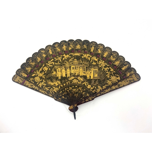 434 - A Chinese Qing Dynasty export lacquer brise fan, early 19th century, ?????, the sticks lacquered bla... 