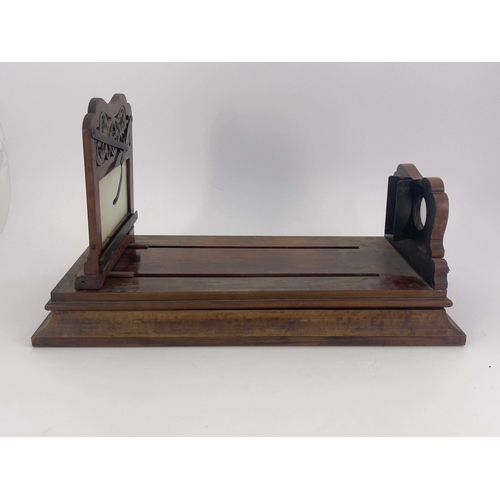 458 - A 19th Century Hudson & Son of Greenwich figured walnut table top stereoscopic viewer, height adjust... 